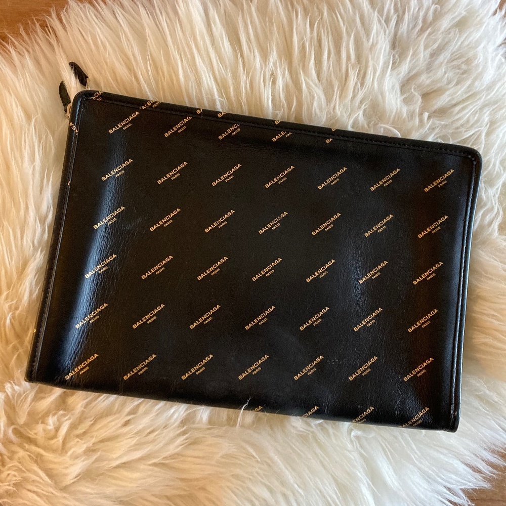 Authentic balenciaga black and gold pouch clutch bag